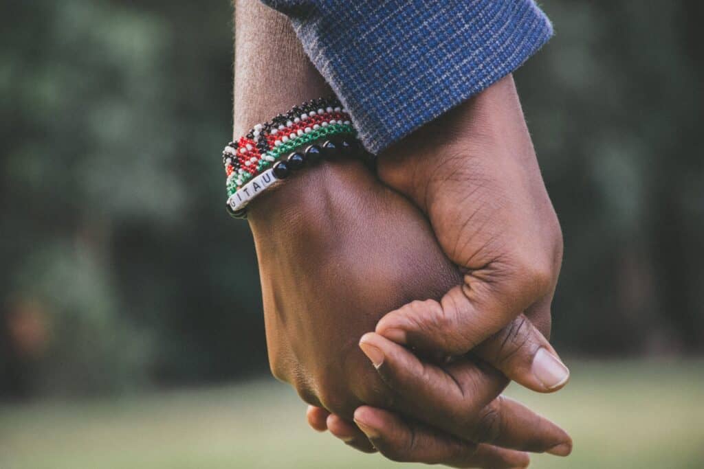 Couple holding hands. Take care of yourself